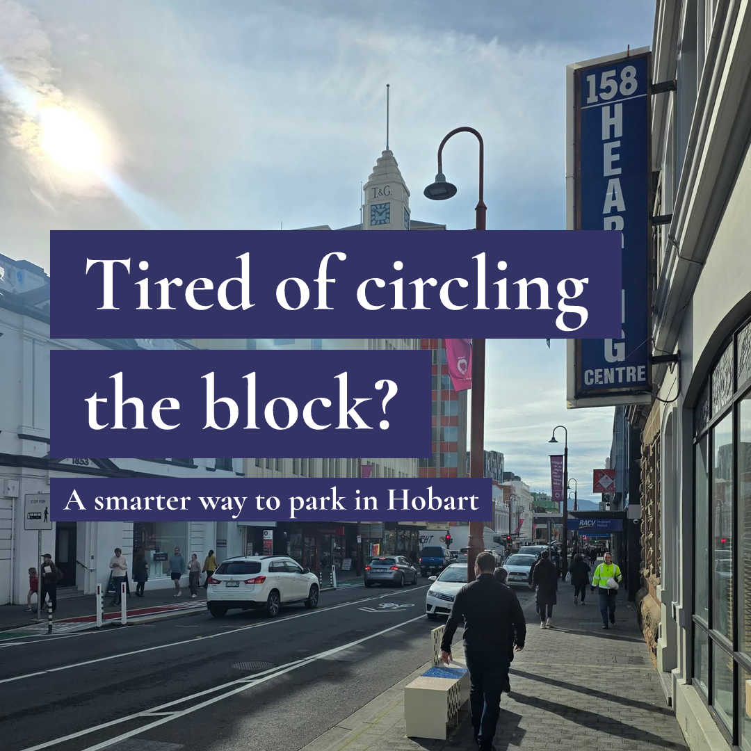 Text 'Tired of circling the block?' over a busy Hobart street with cars, pedestrians and a clock tower.