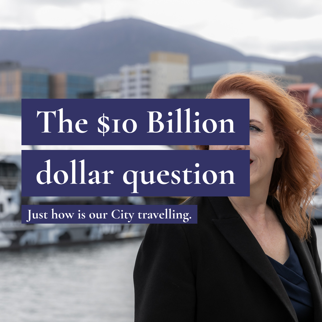 Person in front of Mount Wellington at Wharf